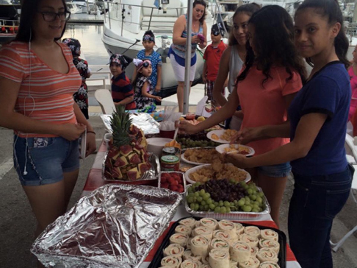 kids birthday party on a pier