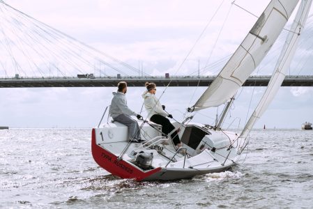 Two people having adventures on their boat trip