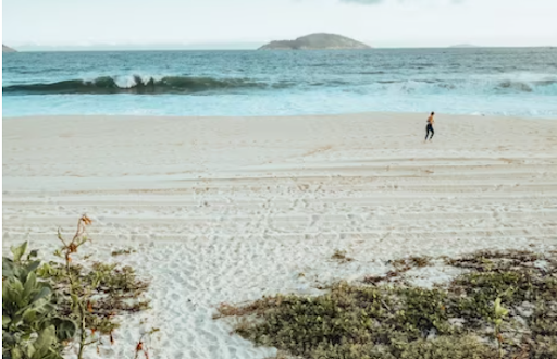 An image of Coastal Shore of Fort Lauderdale with people swimming.