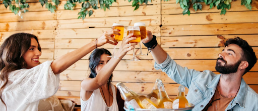 Friends holding craft beers