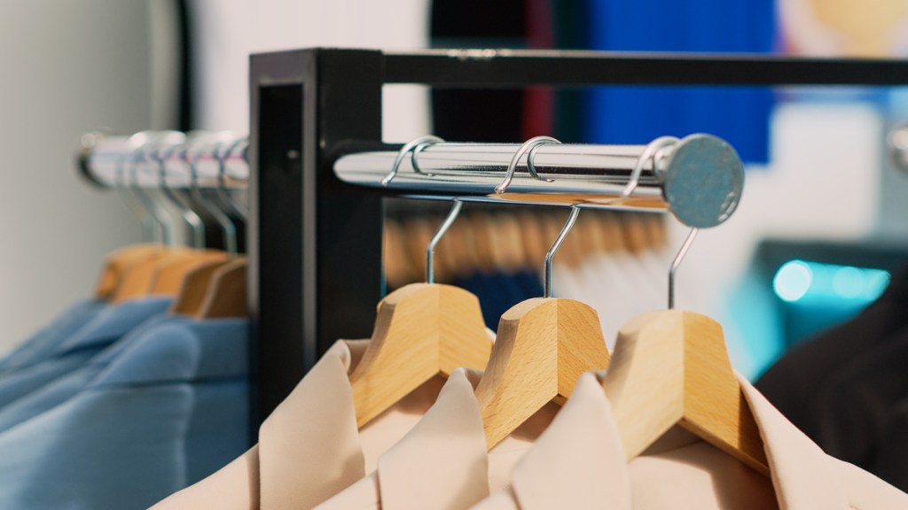 Closeup shot of hangers with modern casual wear